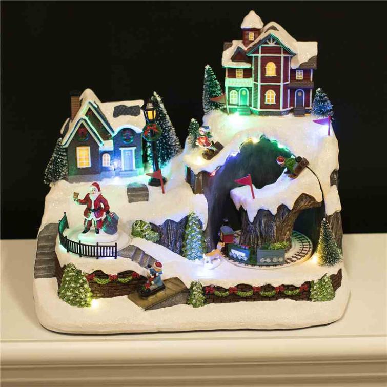 Julbyn "Bergsstaden", med ljus och musik. Batteridriven