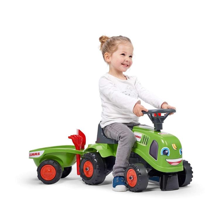 Falk baby Claas lasten traktori, peräkärryllä, haravalla ja lapiolla. 1-3v.