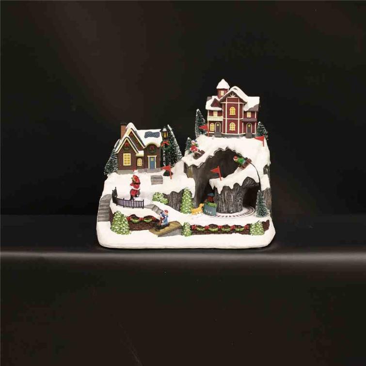 Julbyn "Bergsstaden", med ljus och musik. Batteridriven